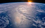 If everyone on Earth sat in the ocean at once, how much would sea level rise?