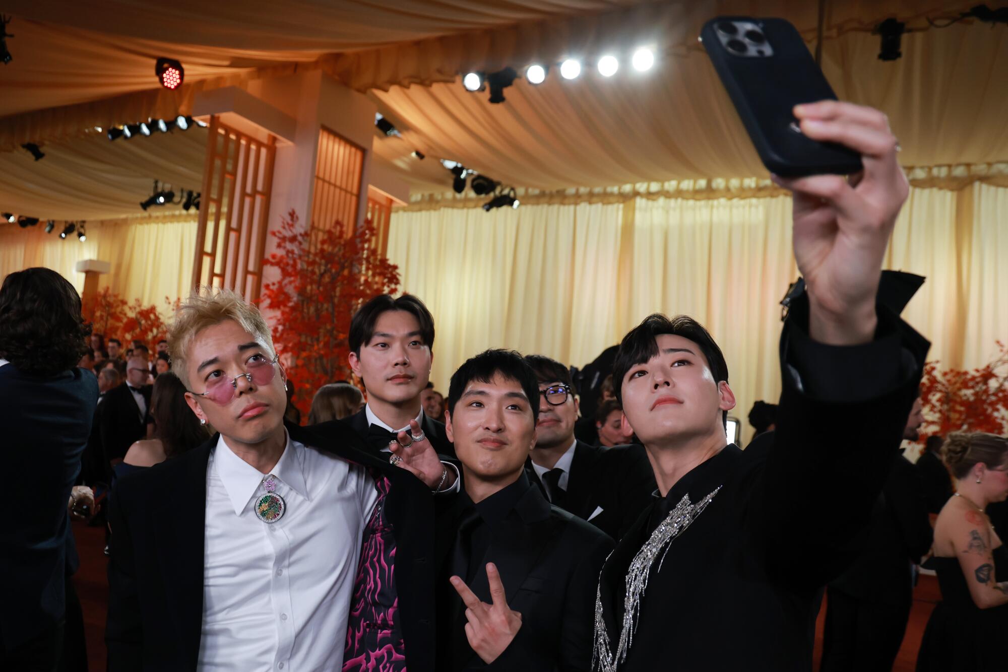 Danny Chung, SamUIL Lee, Danny Chung, Neckwav and Kevin Woo take a selfie.