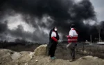 After attacks on Iran's oil facilities, toxic black rain endangers the public