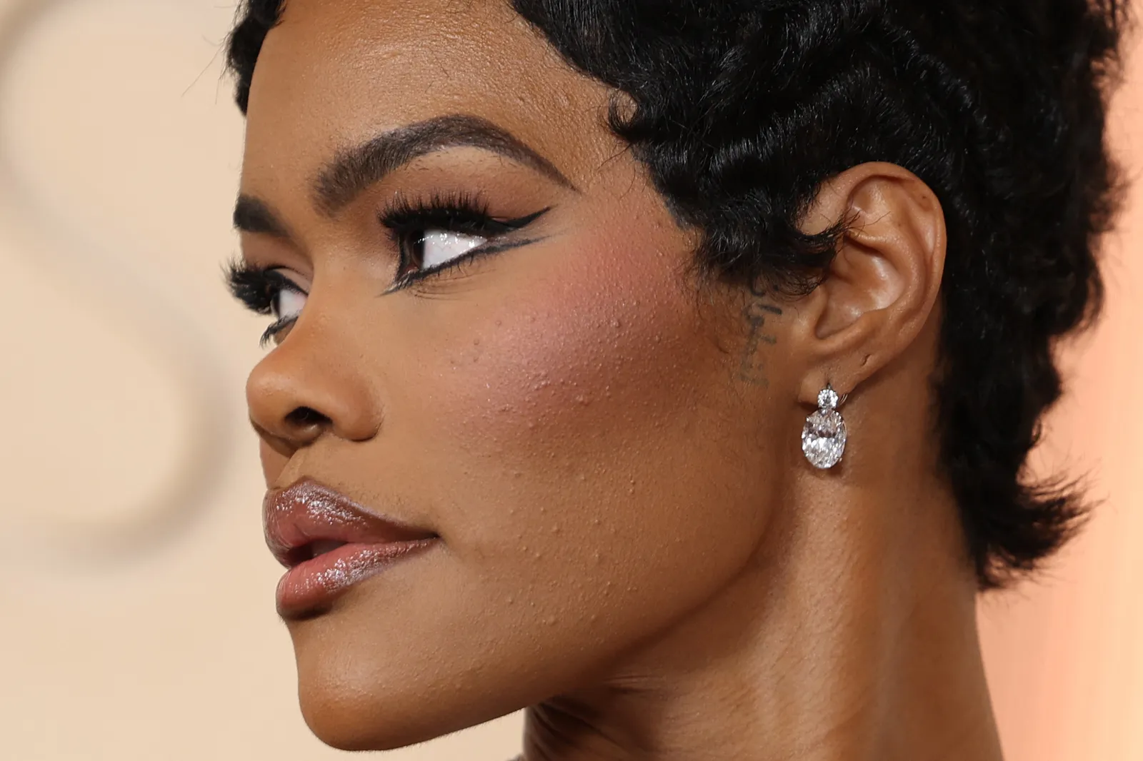 Image may contain Teyana Taylor Person Skin Adult Face Head Accessories Diamond Gemstone Jewelry and Body Part