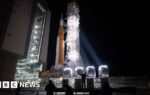 Nasa's Moon rocket Artemis rolls back to pad for possible April launch