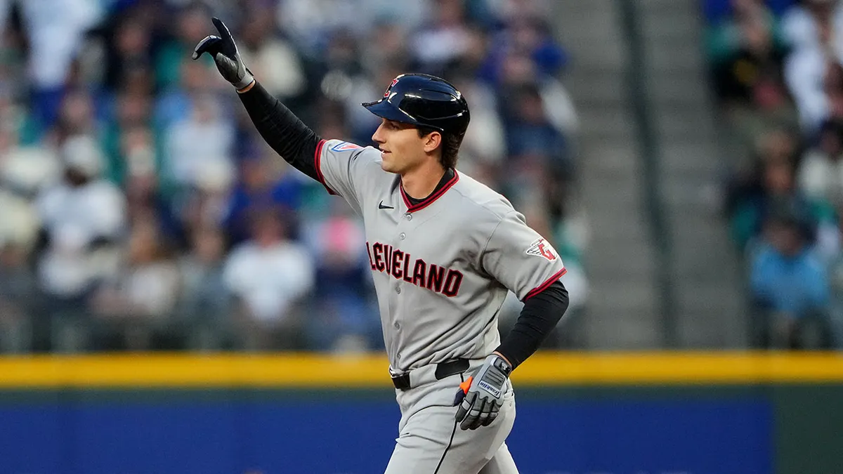 Chase DeLauter rounds bases