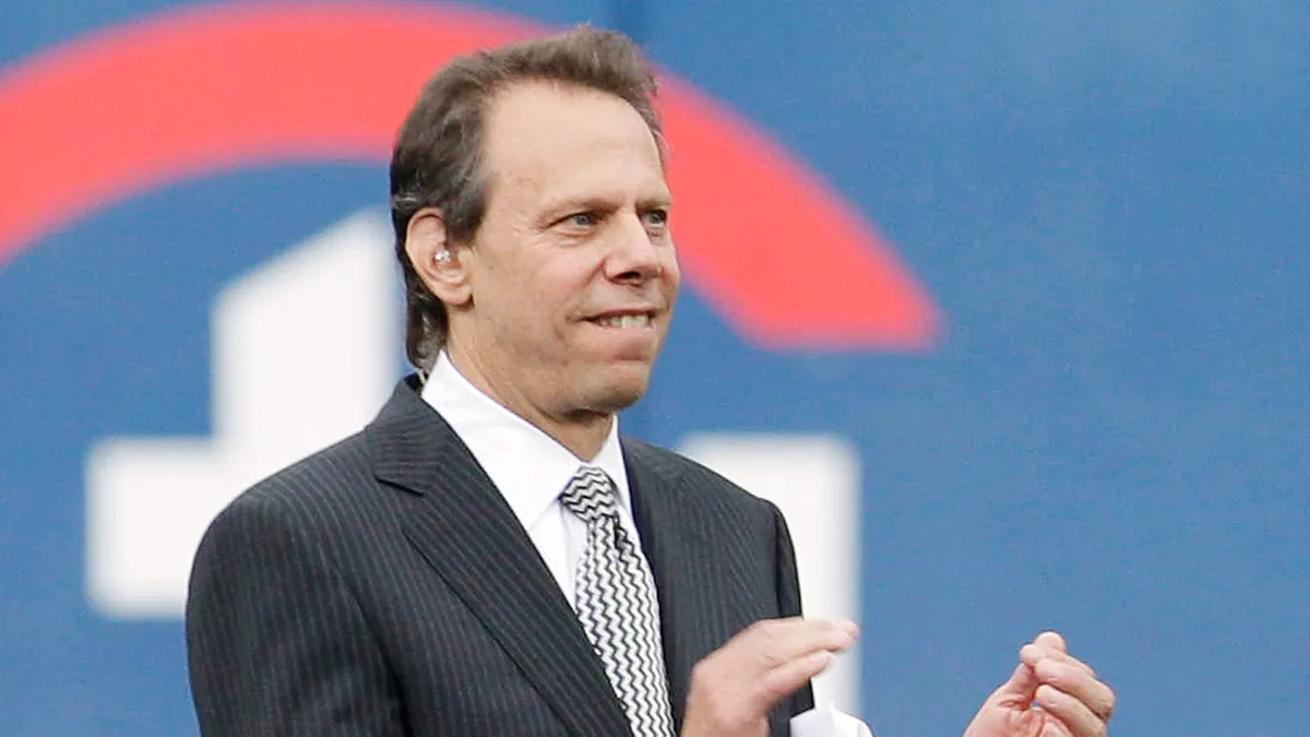 Howie Rose applauds