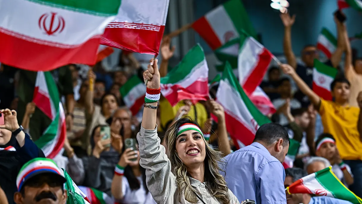Iran fans celebrate in stands