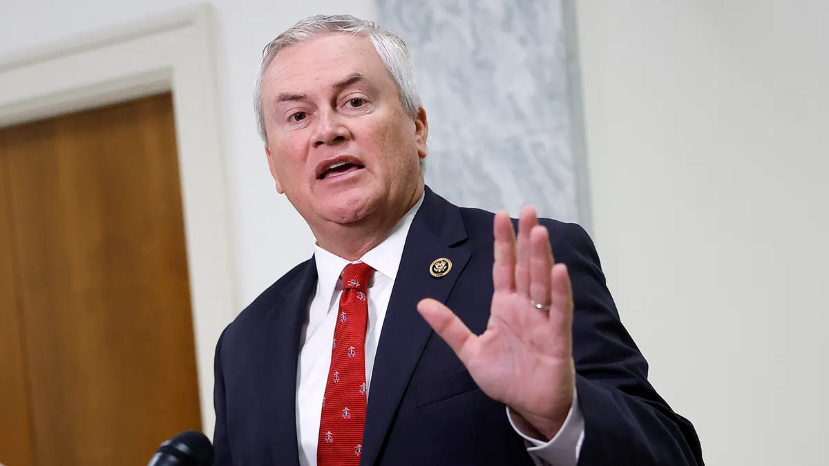 Rep. James Comer talks to reporters.
