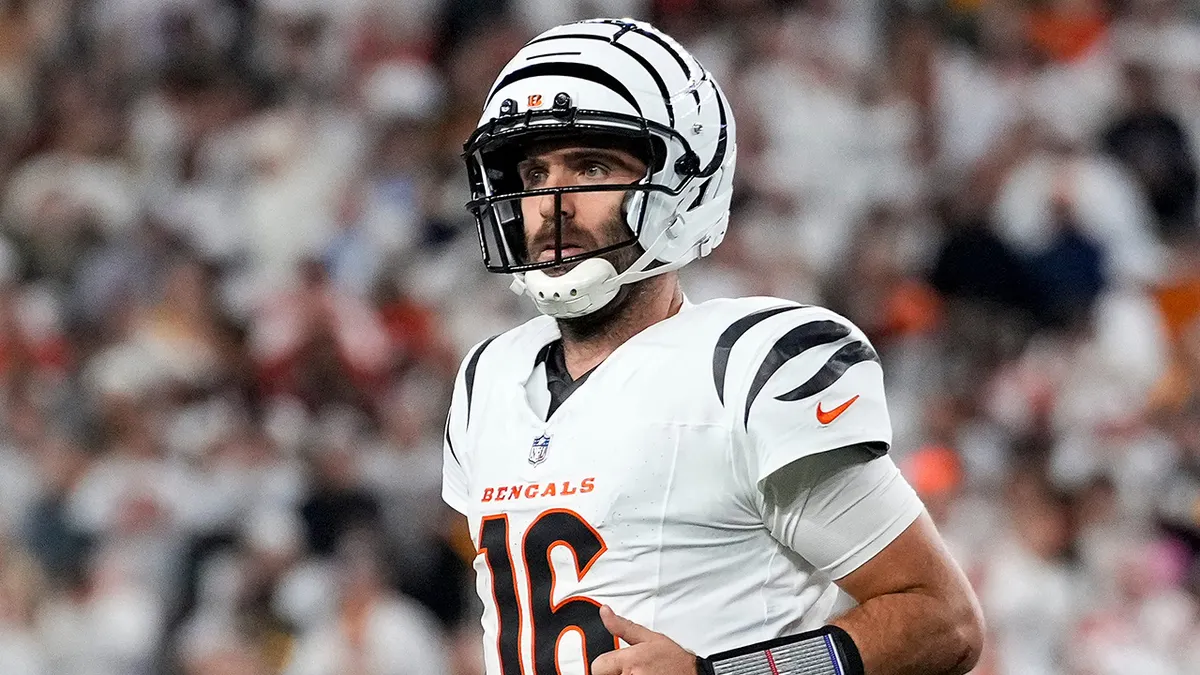 Joe Flacco looks on