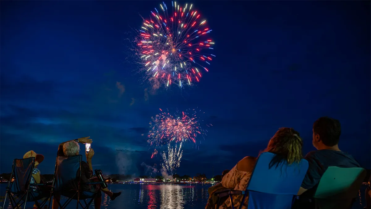 People watch fireworks on July Fourth