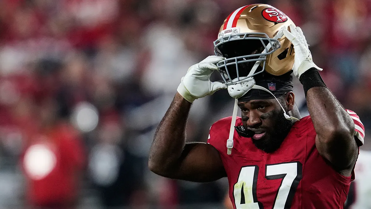 Bryce Huff puts his helmet on