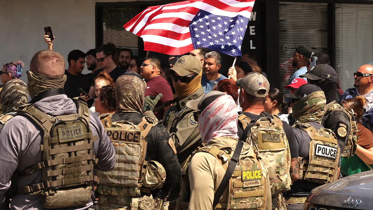 Protesters confront ICE agents during California immigration raid