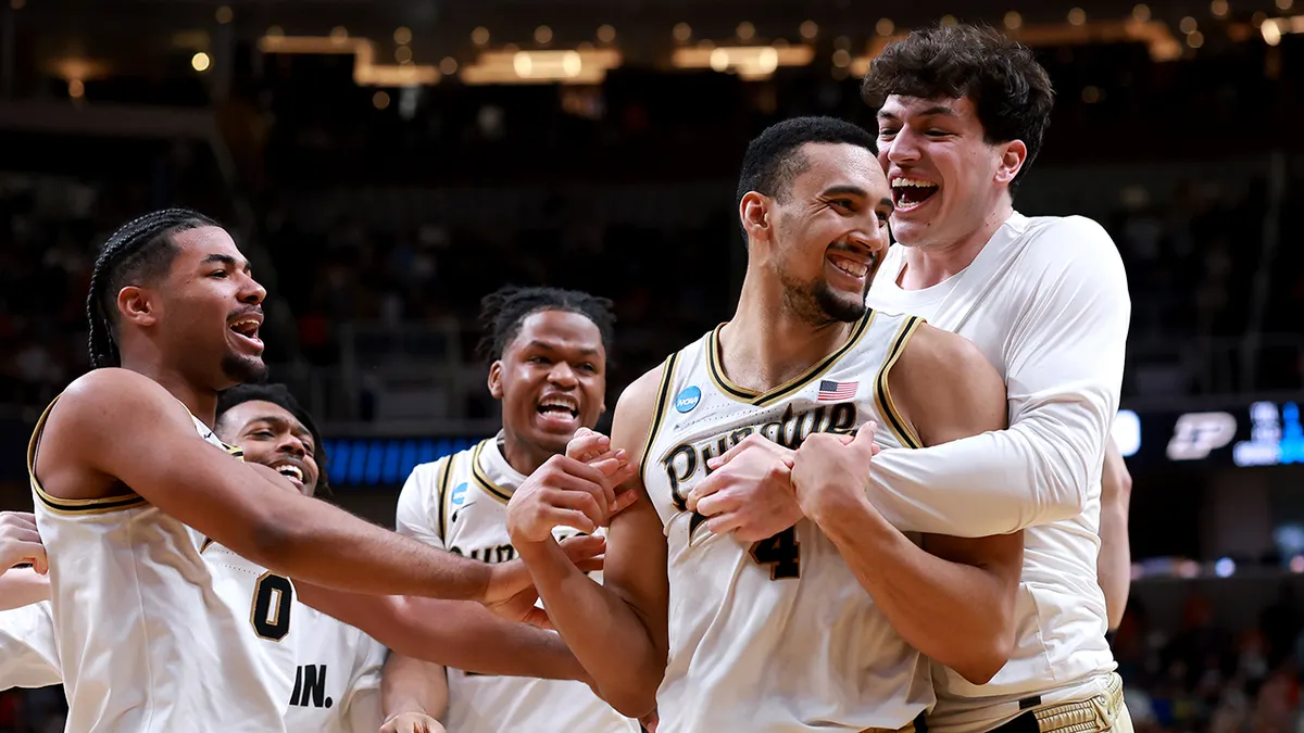 Trey Kaufman-Renn celebrates game-winning basket