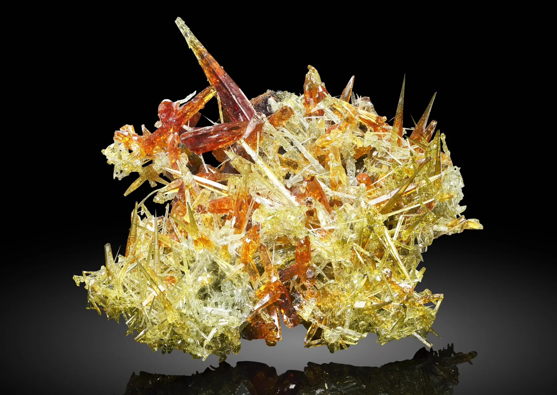 a spiky yellow and orange mineral