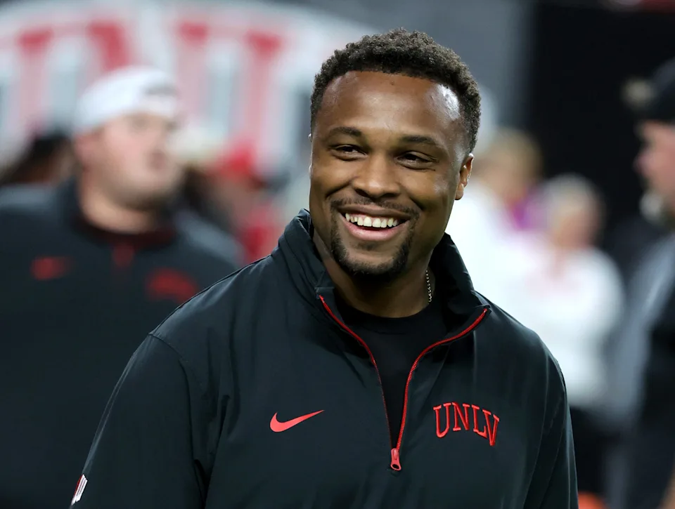 LAS VEGAS, NEVADA - NOVEMBER 30: Offensive coordinator and quarterbacks coach Brennan Marion of the UNLV Rebels looks on during warmups before a game against the Nevada Wolf Pack at Allegiant Stadium on November 30, 2024 in Las Vegas, Nevada. The Rebels defeated the Wolf Pack 38-14. (Photo by Ethan Miller/Getty Images)