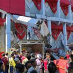 Earthquake off Indonesia topples buildings, kills 1 person and sets off small tsunami