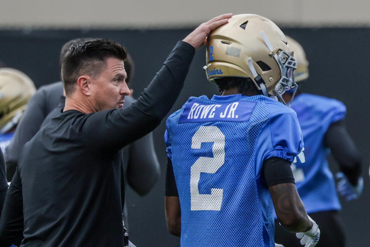UCLA coach Bob Chesney leads the Bruins through their first spring football workouts on Thursday.