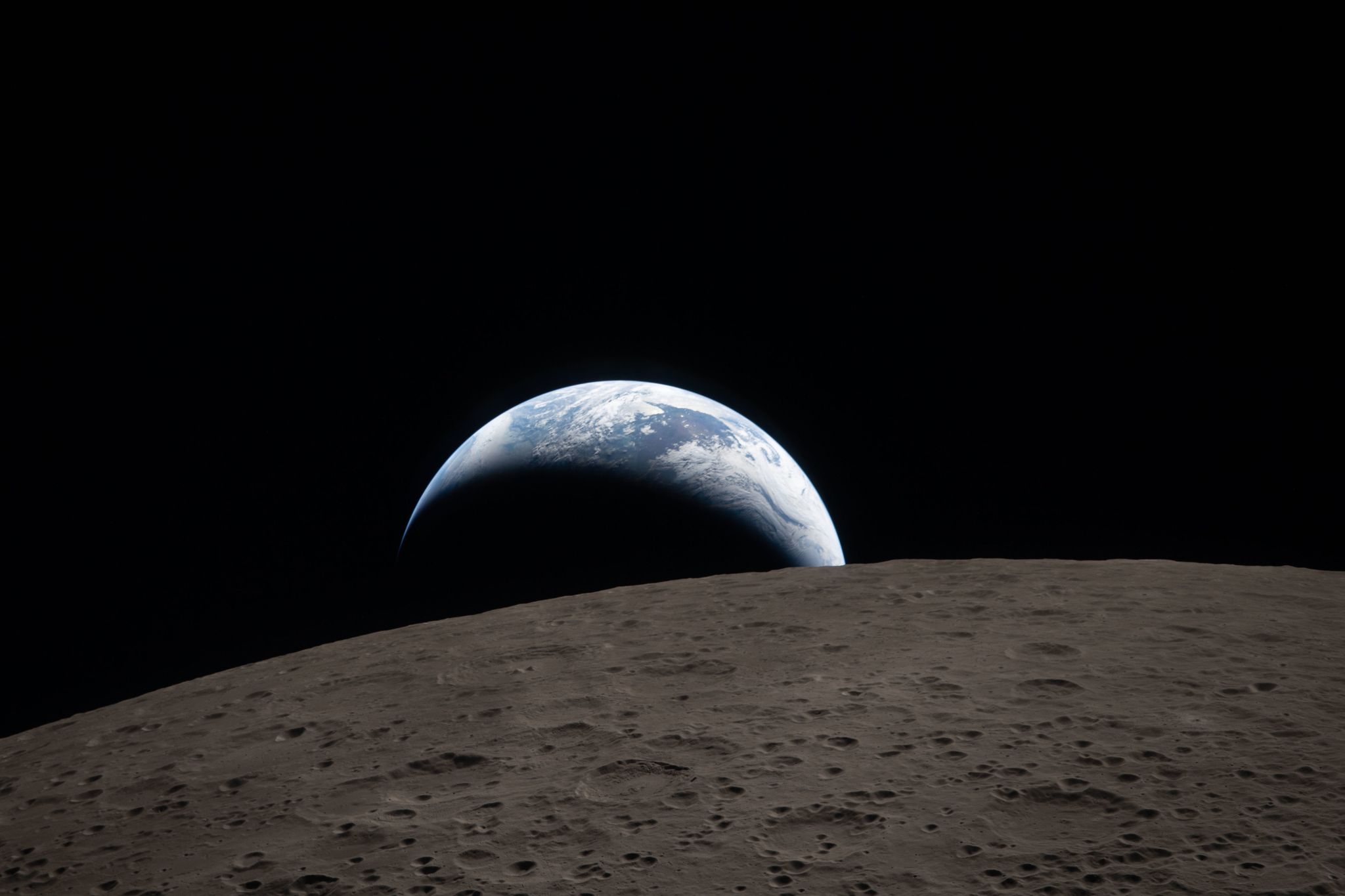 Artemis II astronauts channel Apollo 8 with a striking Earthset photo