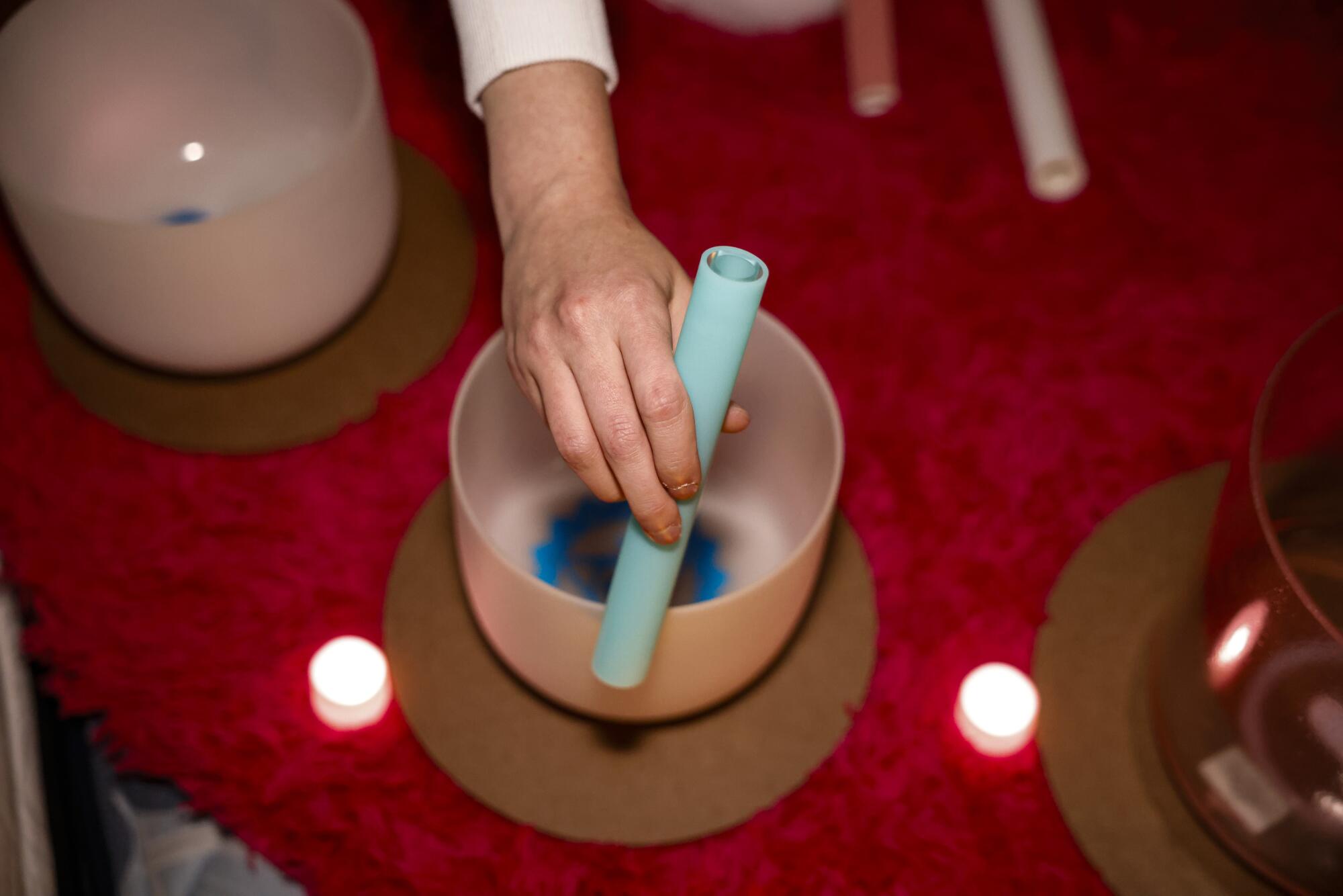 Alice Moon performs with crystal singing bowls.