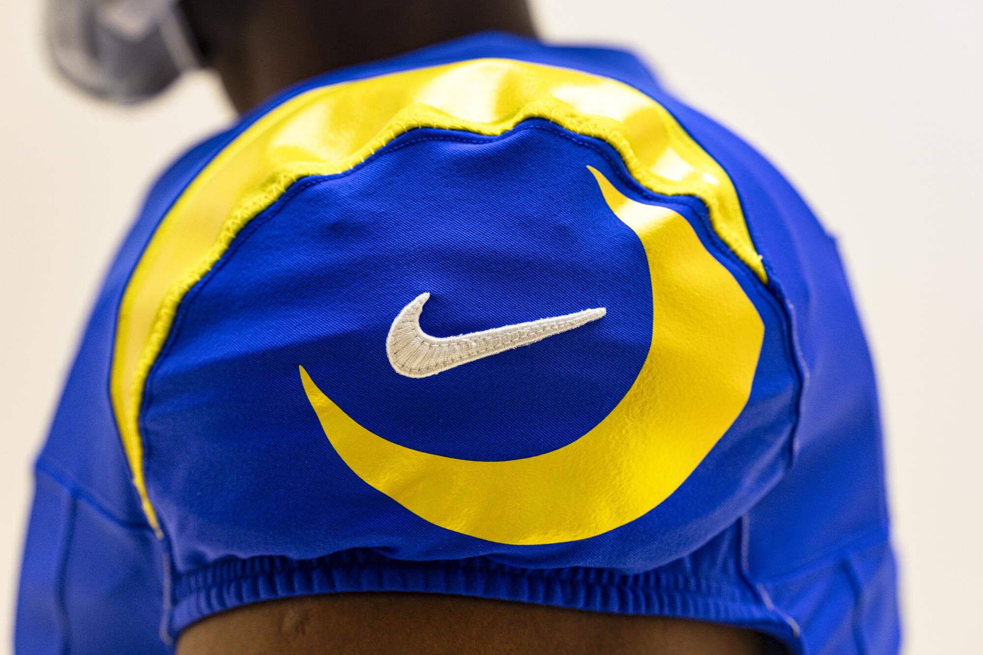 A detailed look at the Rams' new blue uniform sleeve with yellow accents.