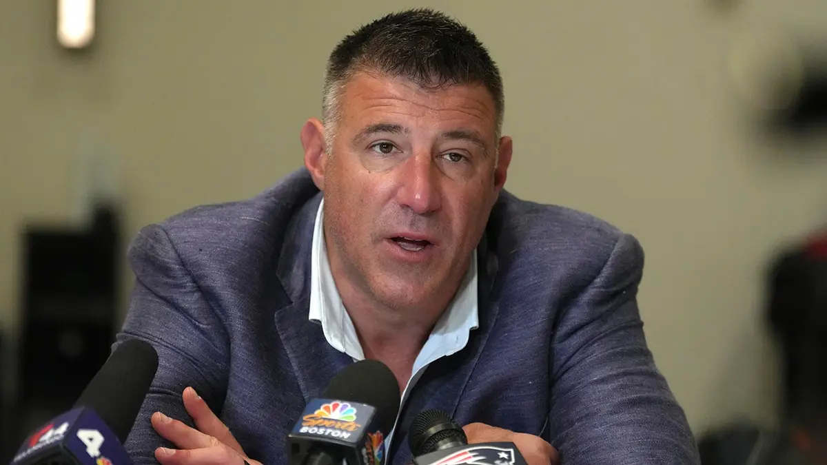 New England Patriots head coach Mike Vrabel speaking to reporters at NFL annual meetings