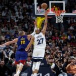 Rudy Gobert contains Nuggets' Nikola Jokic as Wolves tie series