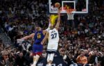 Rudy Gobert contains Nuggets' Nikola Jokic as Wolves tie series