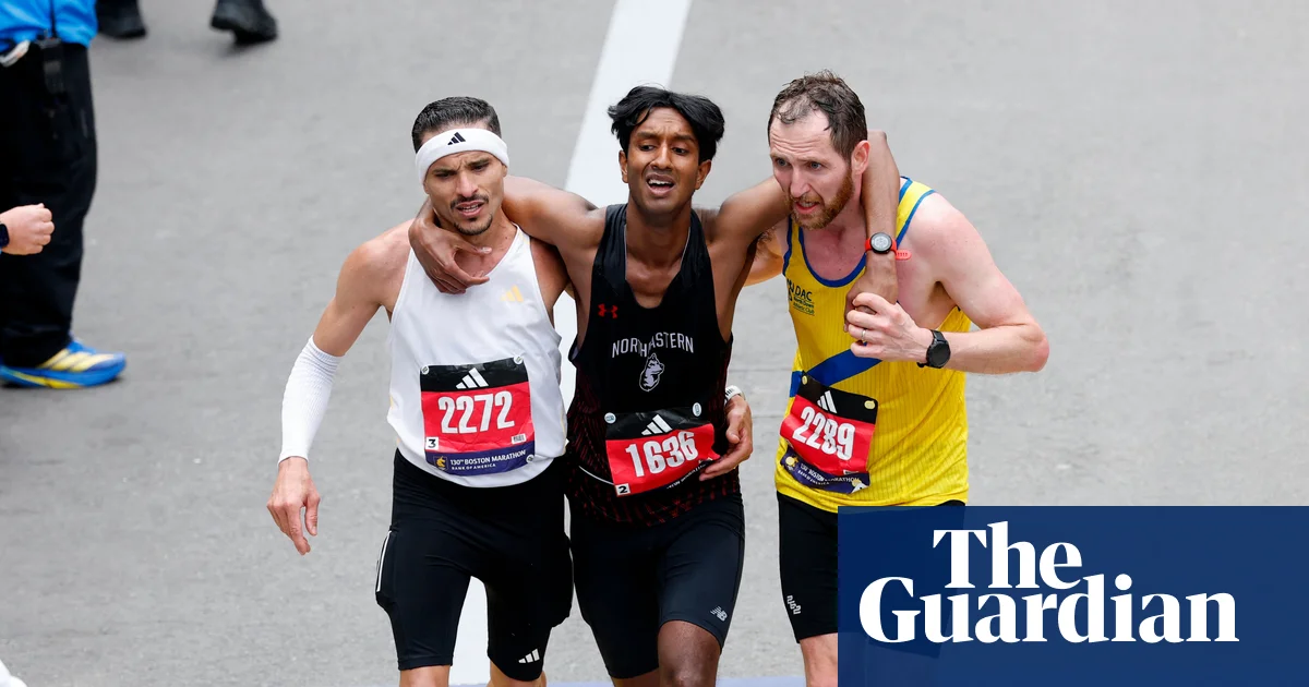 ‘Two are stronger than one’: Boston Marathon duo praised for helping struggling runner cross finish line | Boston Marathon