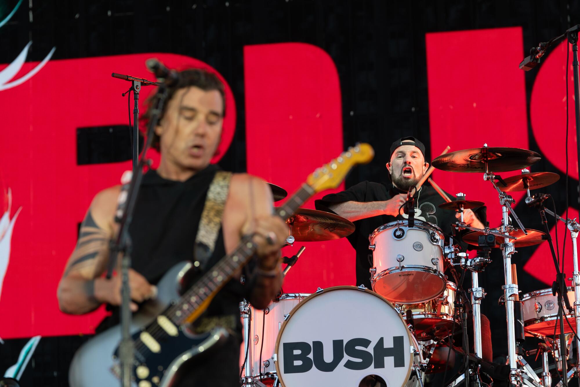 Gavin Rossdale and drummer Nik Hughes perform with Bush on Saturday.