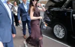 Anne Hathaway Proves Every Summer Slip Dress Needs High-Contrast Sneakers and No-Show Socks