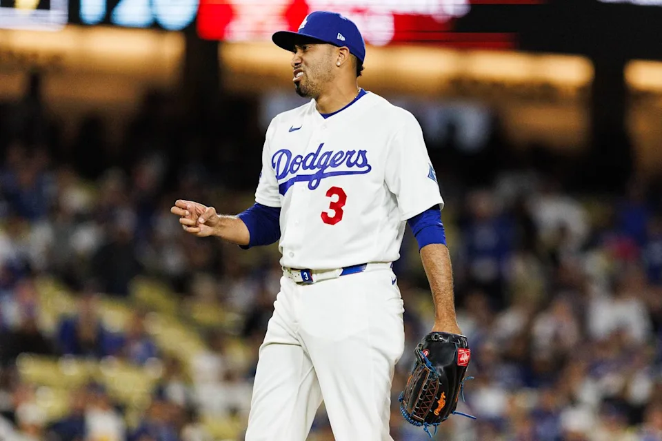 Edwin Díaz #3 of the Los Angeles Dodgers signals a strike during an MLB game against the Texas Rangers at Dodger Stadium on April 10, 2026 in Los Angeles, California.