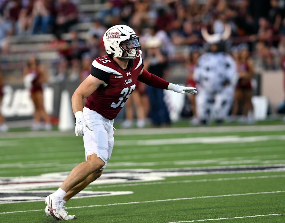 Linebacker Tyler Martinez drops back in pass coverage as the Aggies opened their season on Saturday night against the Bryant Bulldogs at Aggie Memorial Stadium.