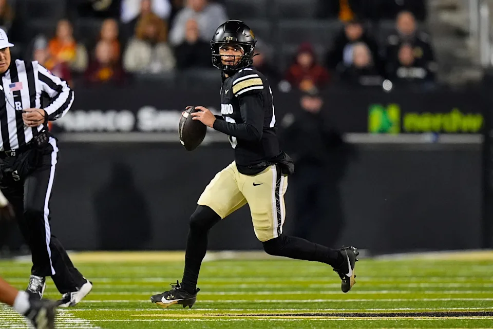 Nov 22, 2025; Boulder, Colorado, USA; Colorado Buffaloes quarterback Julian Lewis (10) scrambles in the first quarter against the Arizona State Sun Devils at Folsom Field. Mandatory Credit: Ron Chenoy-Imagn Images