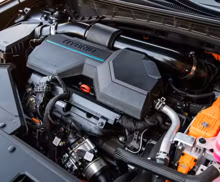 Shot of the engine under the hood of a 2026 Hyundai Tucson Hybrid.