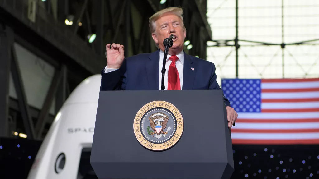 President Donald Trump speaks inside the Vehicle Assembly Building following the launch of a SpaceX Falcon 9 rocket.