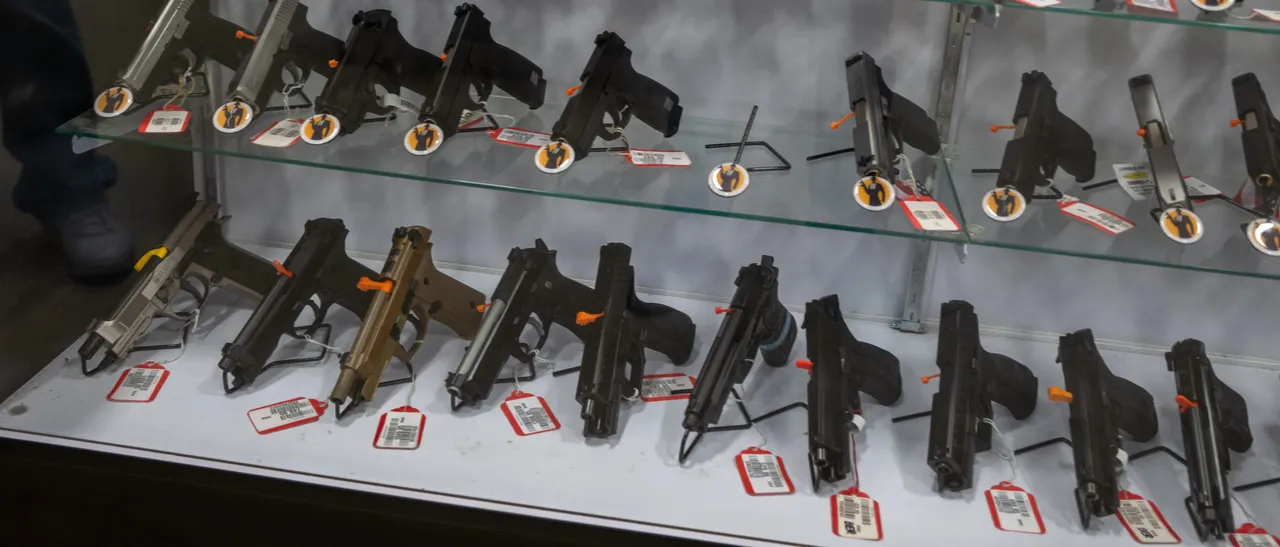 GREELEY, PENNSYLVANIA - OCTOBER 09: Hand guns are displayed in a store during the Rod of Iron Freedom Festival on October 09, 2022 in Greeley, Pennsylvania. (Photo by Spencer Platt/Getty Images)