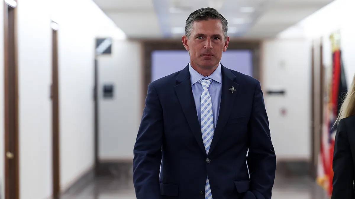 Sen. Martin Heinrich walking into the Dirksen Senate Office Building in Washington, D.C.