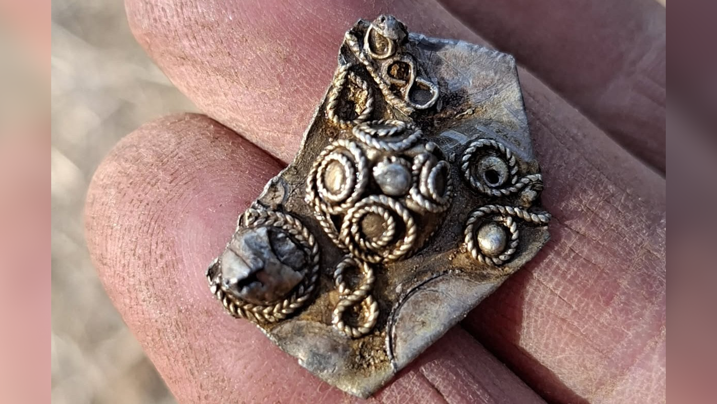 a person shows off a piece of hacksilver