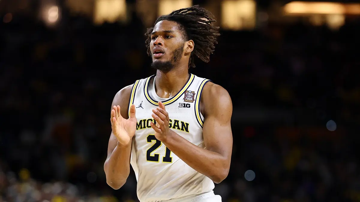 Morez Johnson Jr. celebrating after scoring a basket.