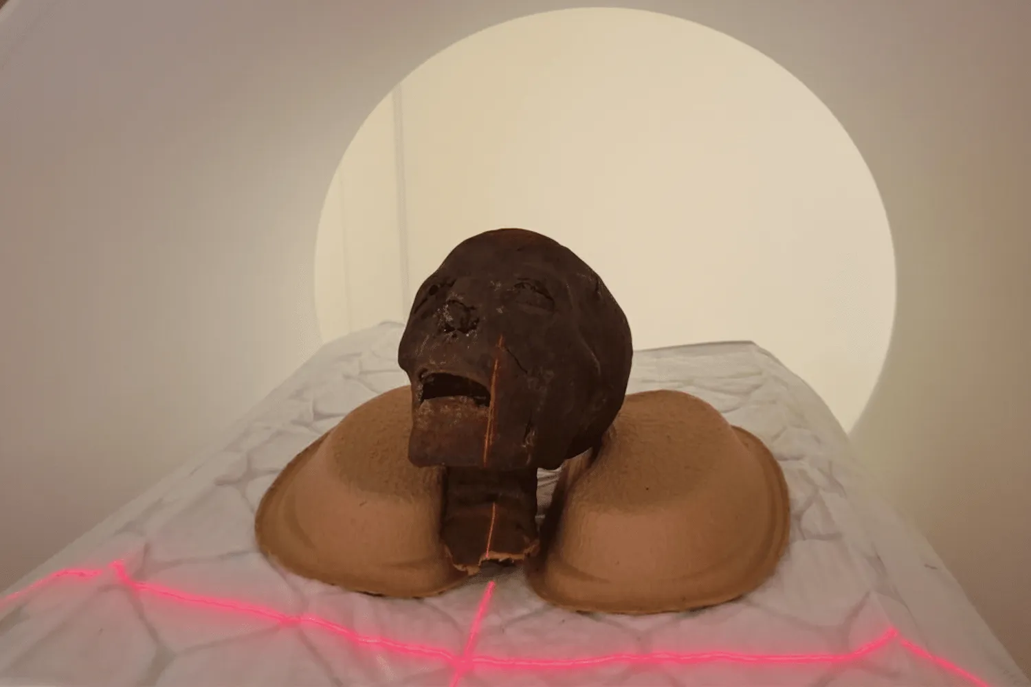 Mummy head placed in CT scanner