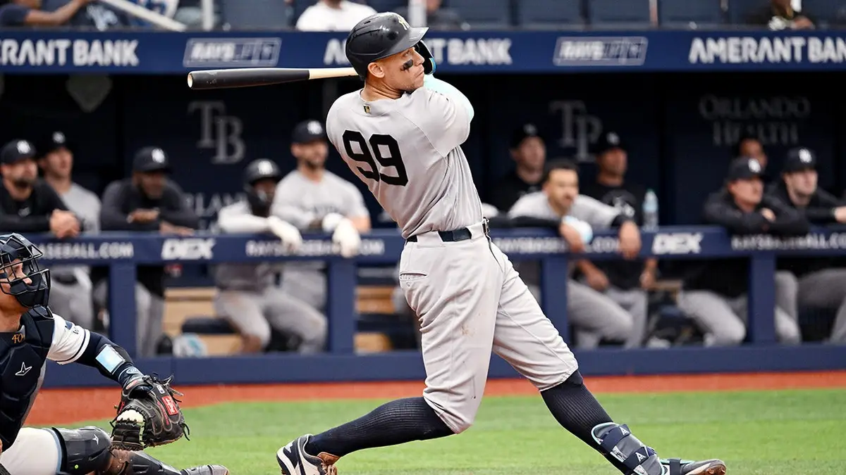 New York Yankees' Aaron Judge hitting a baseball during a game.