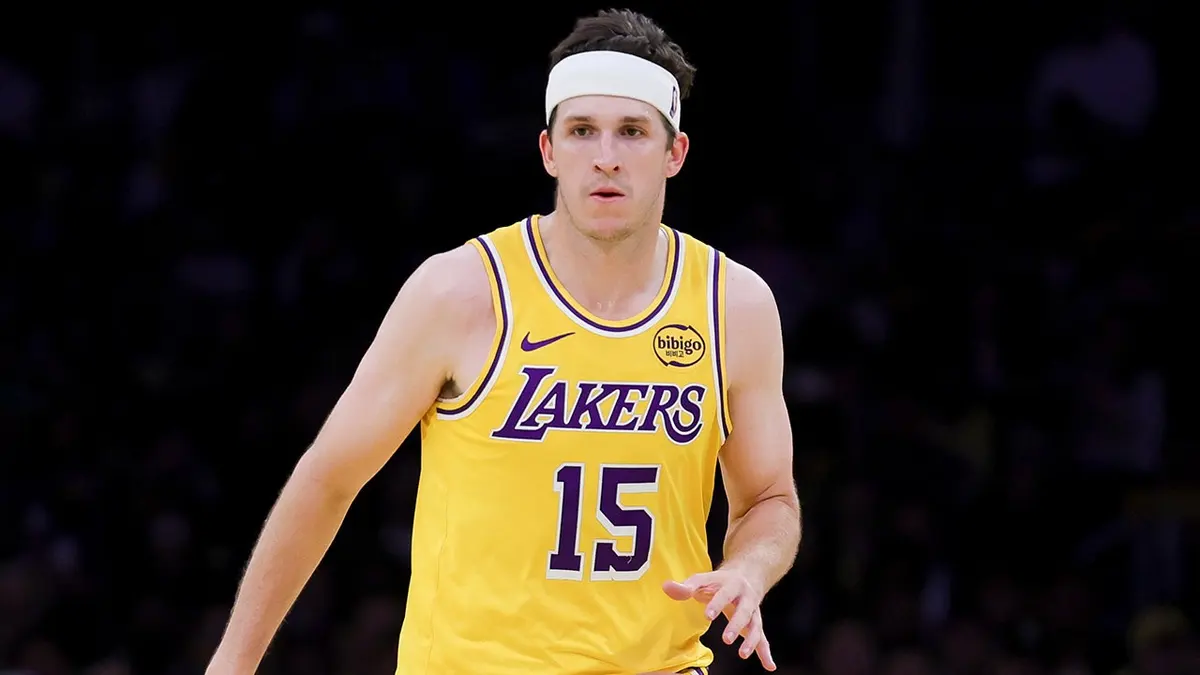 Austin Reaves dribbling basketball during NBA game in Los Angeles