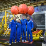 Artemis II's moon-traveling astronauts return home to cheers after a record-breaking trip