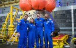 Artemis II's moon-traveling astronauts return home to cheers after a record-breaking trip