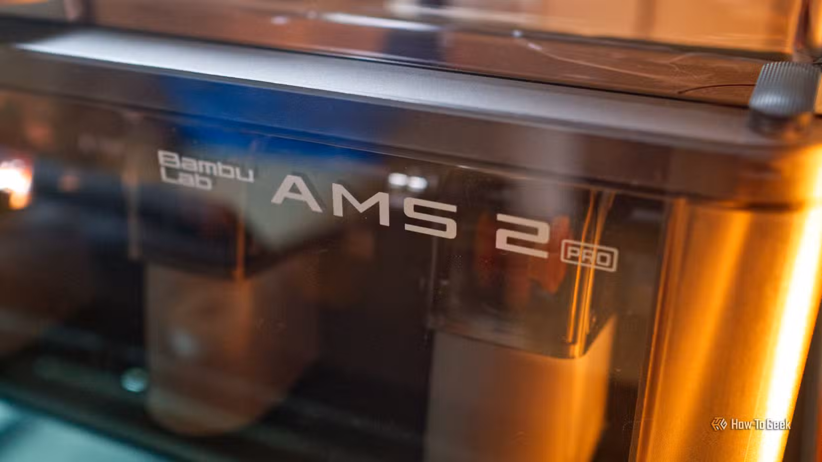 Bambu Lab AMS 2 Pro attached to a P2S 3D printer.