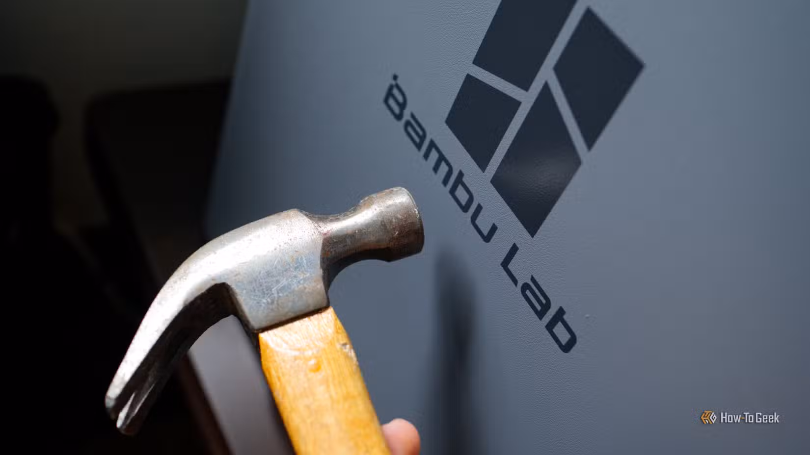 Bambu Lab P2S printer with hammer.