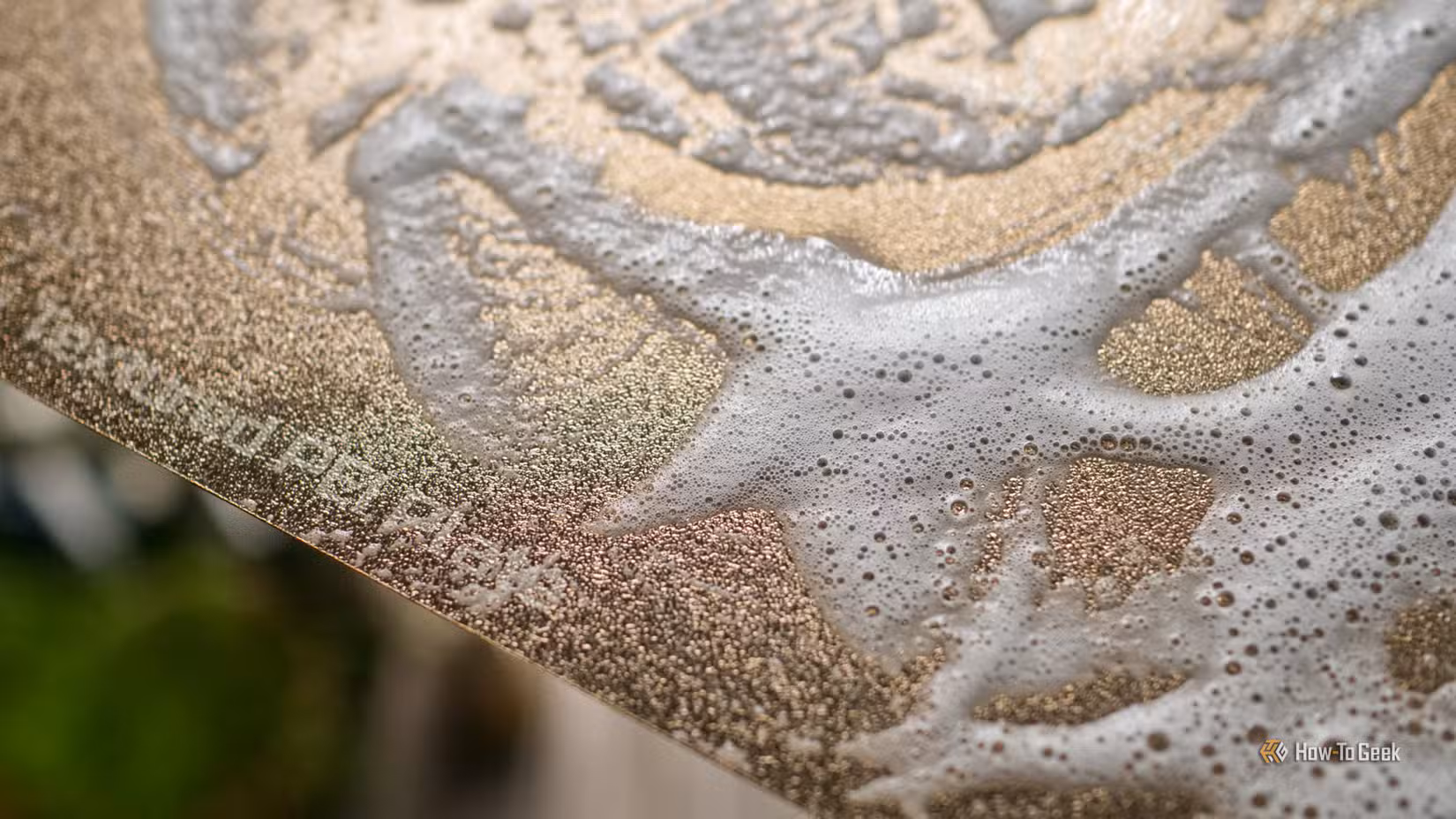 Bambu Lab PEI built plate with soap on it.