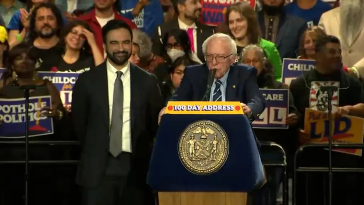 bernie sanders speaking at podium