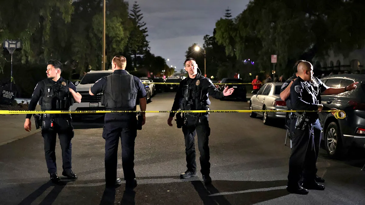 Law enforcement officials blocking off a street in Torrance, California