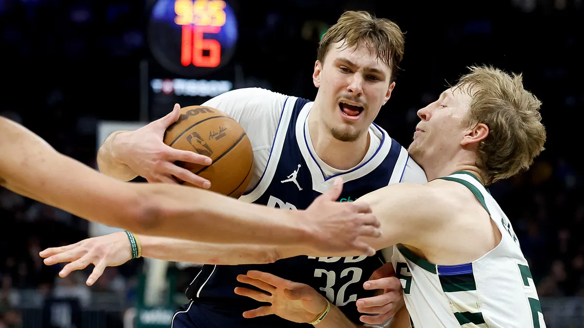 Cooper Flagg drives to basket