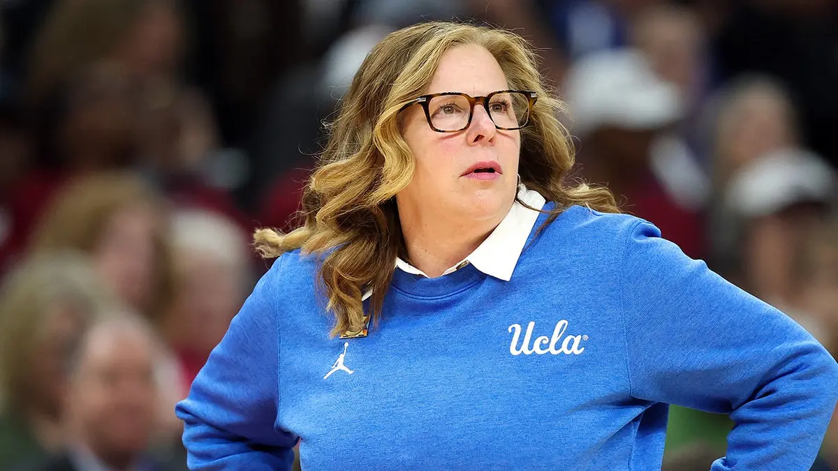 Head coach Cori Close of UCLA Bruins watching game during NCAA women's basketball championship.