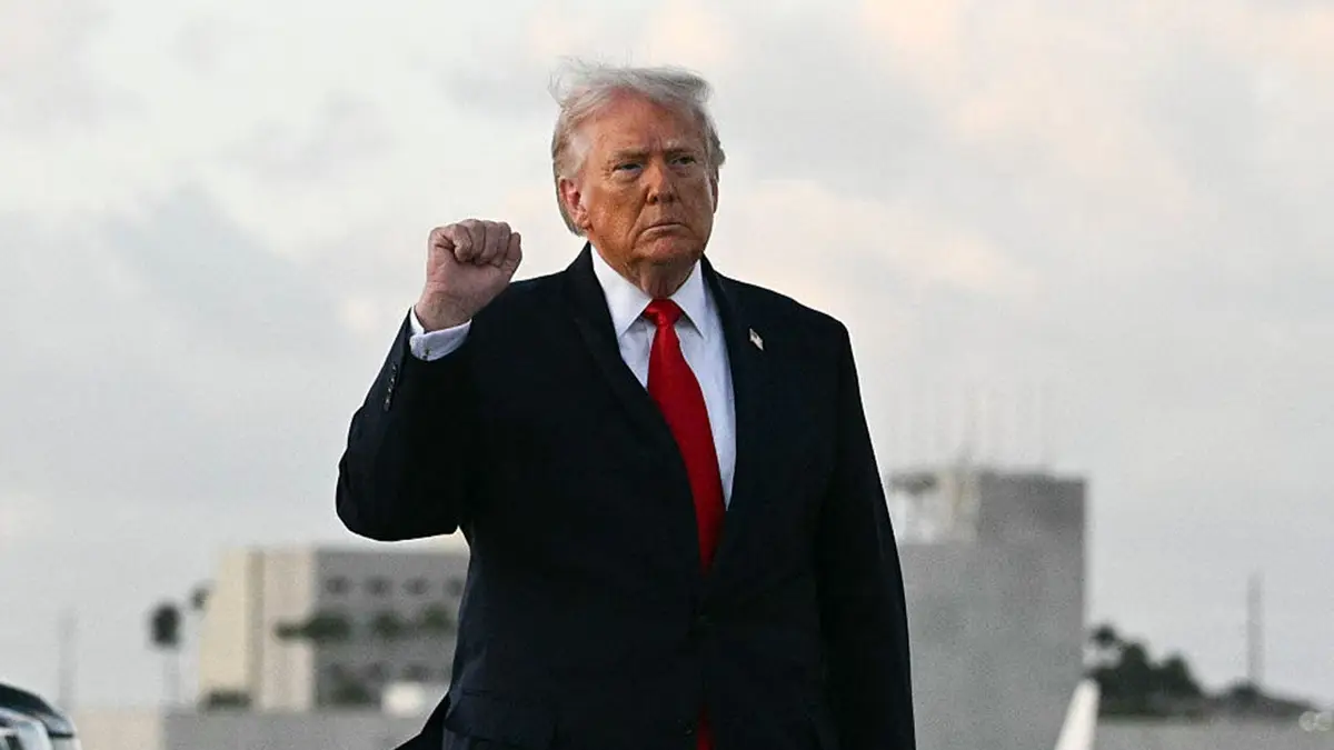 donald trump with his fist in the air