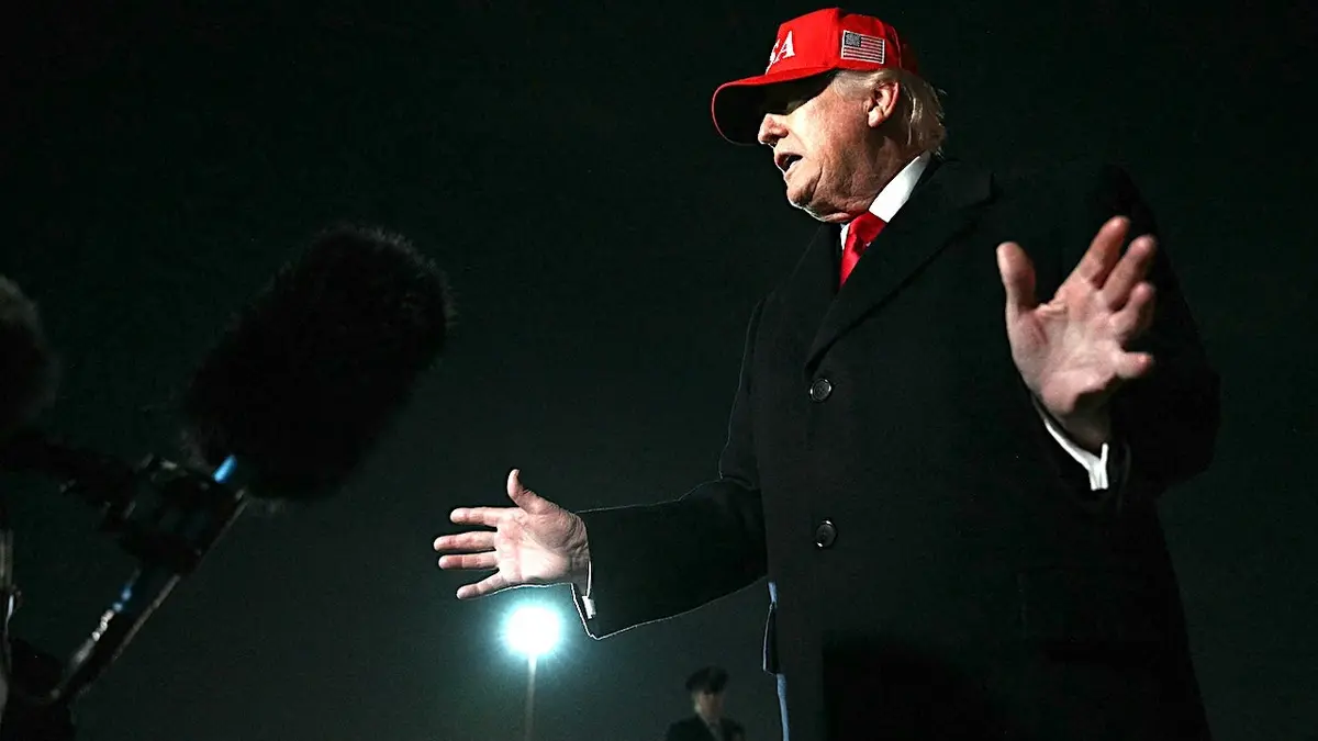 US President Donald Trump speaking to press on tarmac at Joint Base Andrews in Maryland
